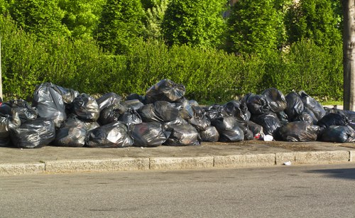 Household and recyclable waste being sorted